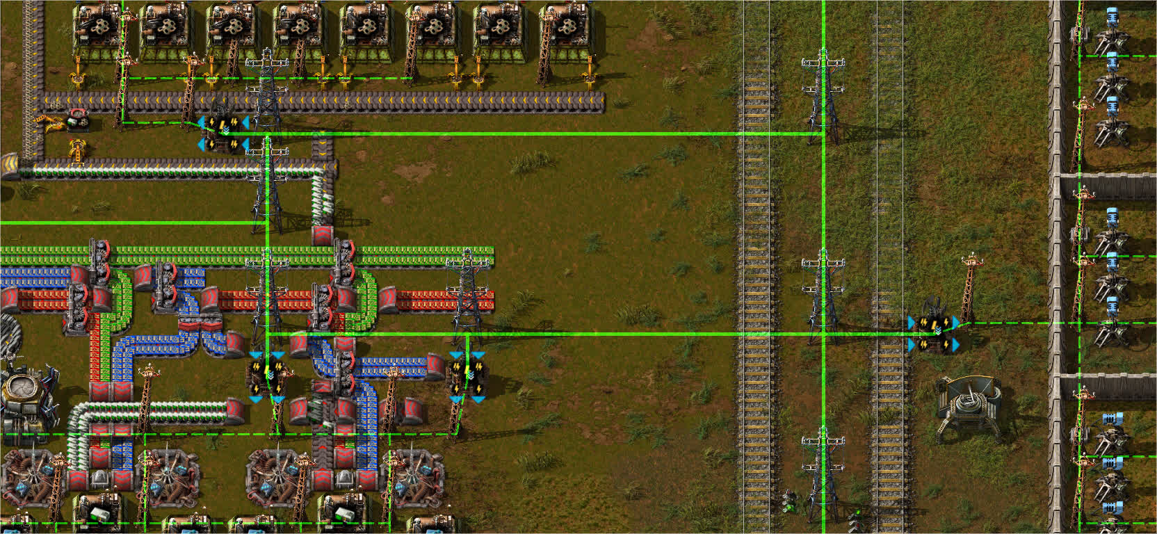 Example of main high voltage line (solid in-game overlay) with transformers stepping down the voltage to machines (dashed in-game overlay). This allows for simplistic power distribution.